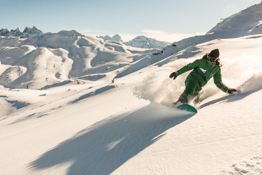 Powder snow ski and snowboard lessons