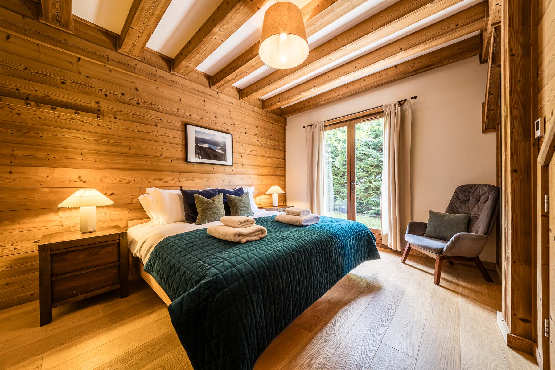Double bedroom at Chalet Coffy in summer