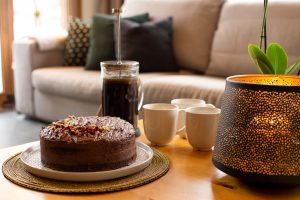 Homemade chocolate cake and coffee served at Chalet Coffy in Morzine