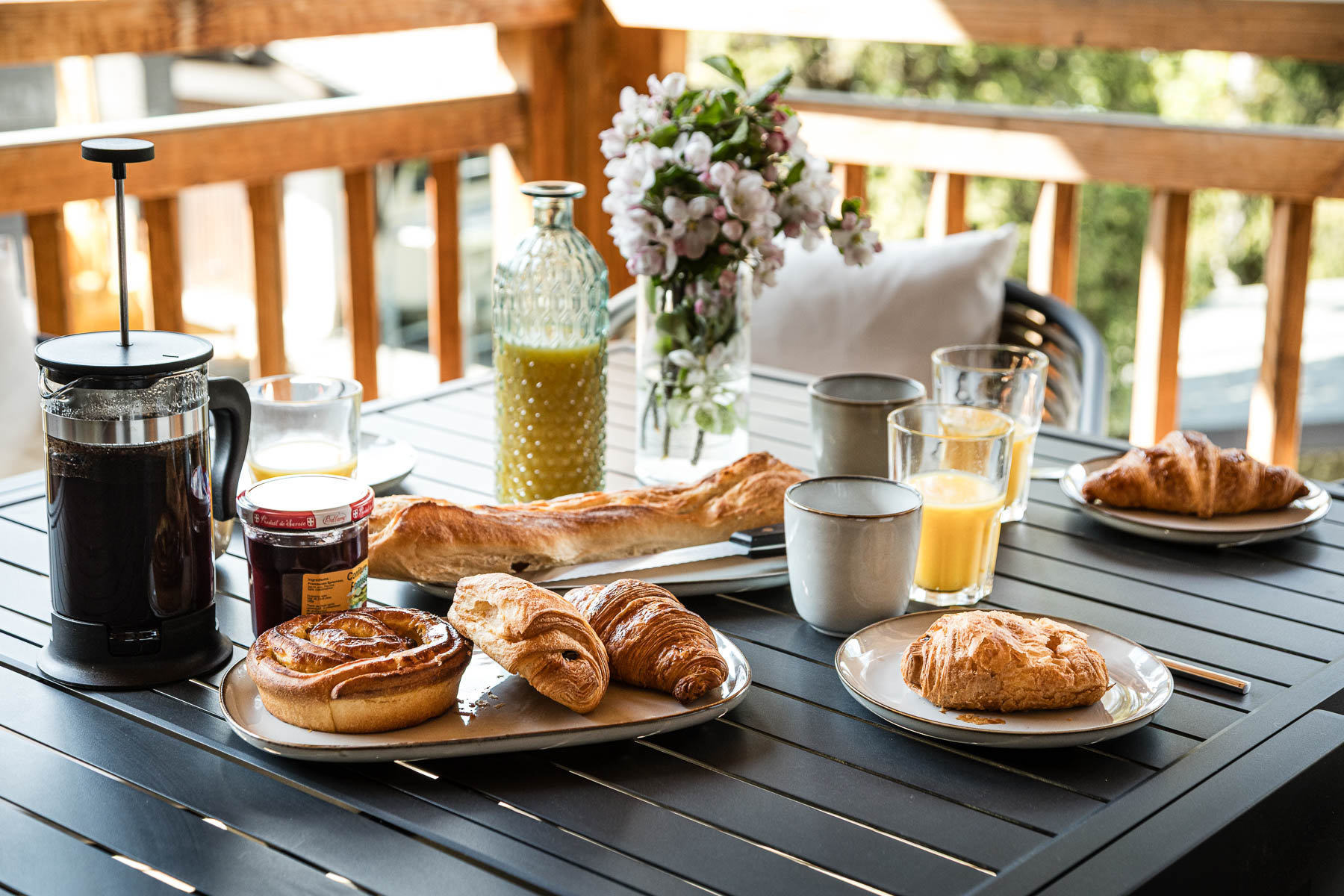Breakfast spread served on the Chalet Floralies balcony