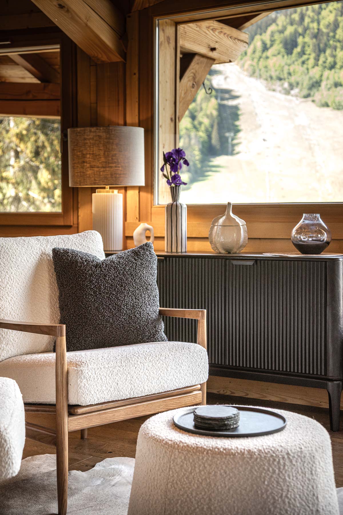 Lounge armchair overlooking the mountains at Chalet Floralies