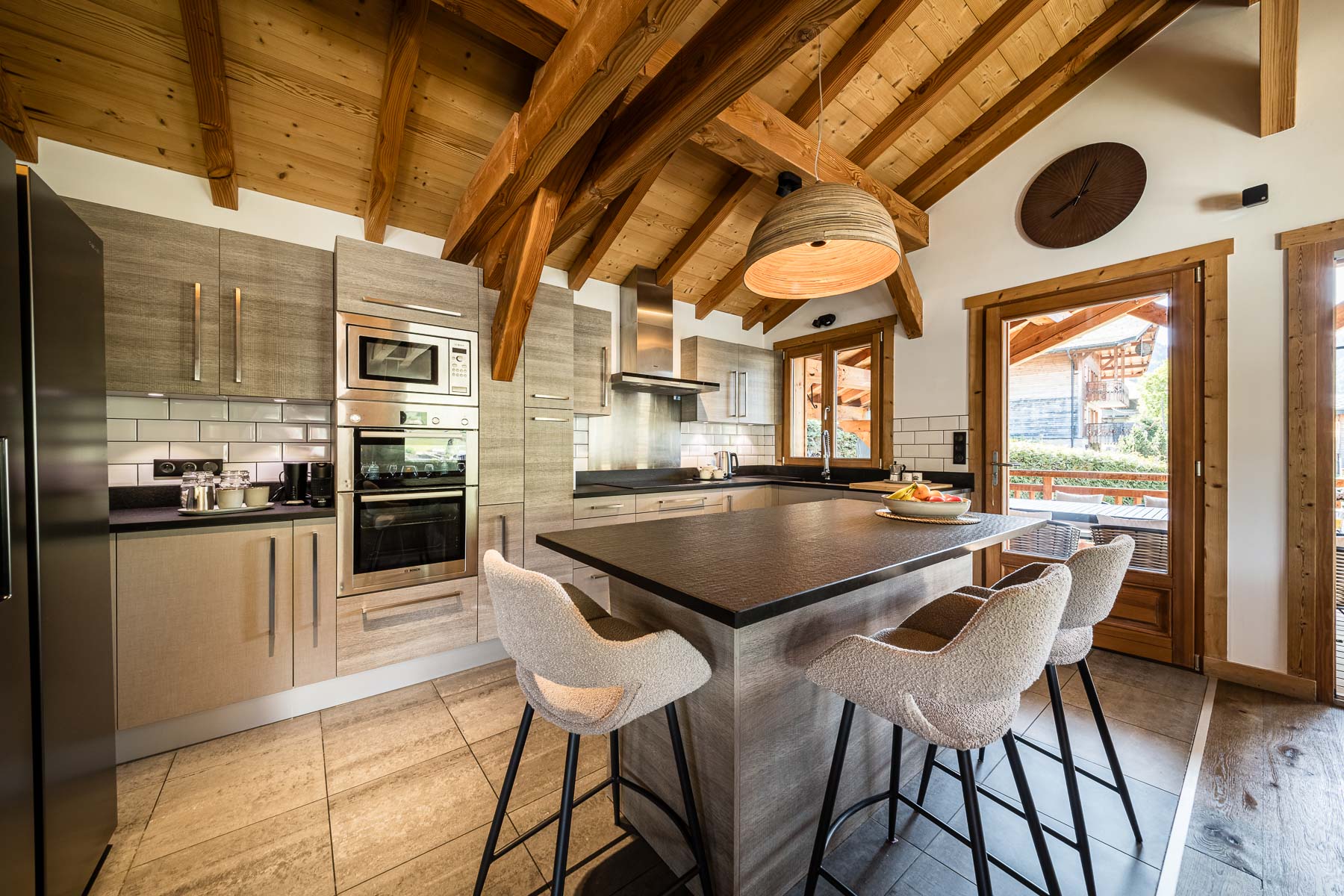 Modern kitchen island at Chalet Floralies
