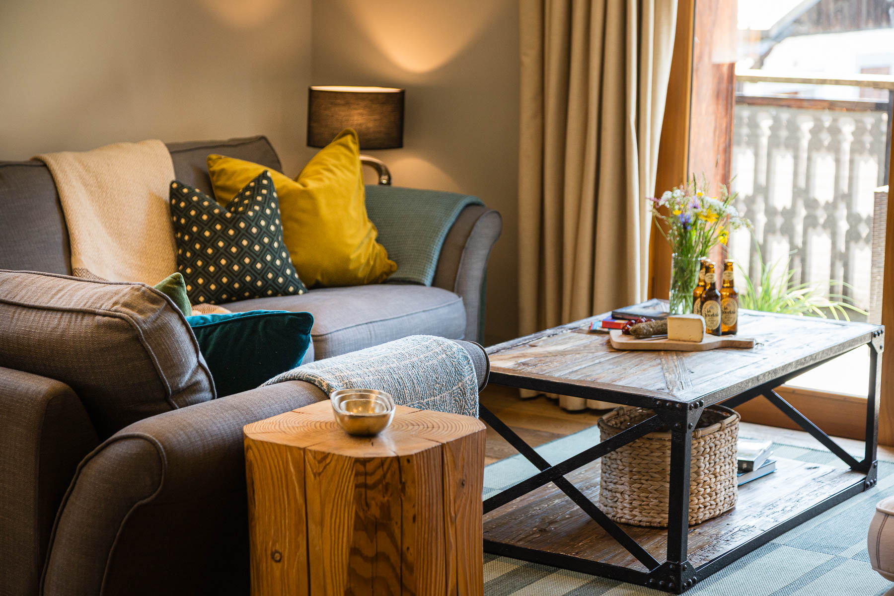 Cosy lounge and coffee table at Chalet La Grange