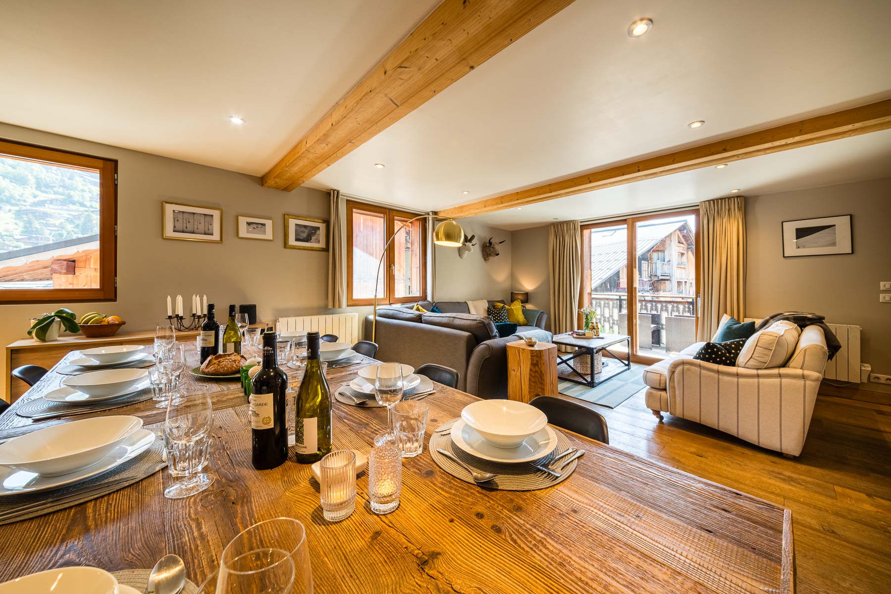 Open-plan dining and lounge area at Chalet La Grange