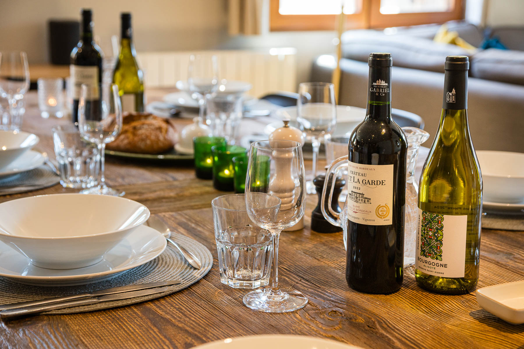 Dining table set with wine at Chalet La Grange