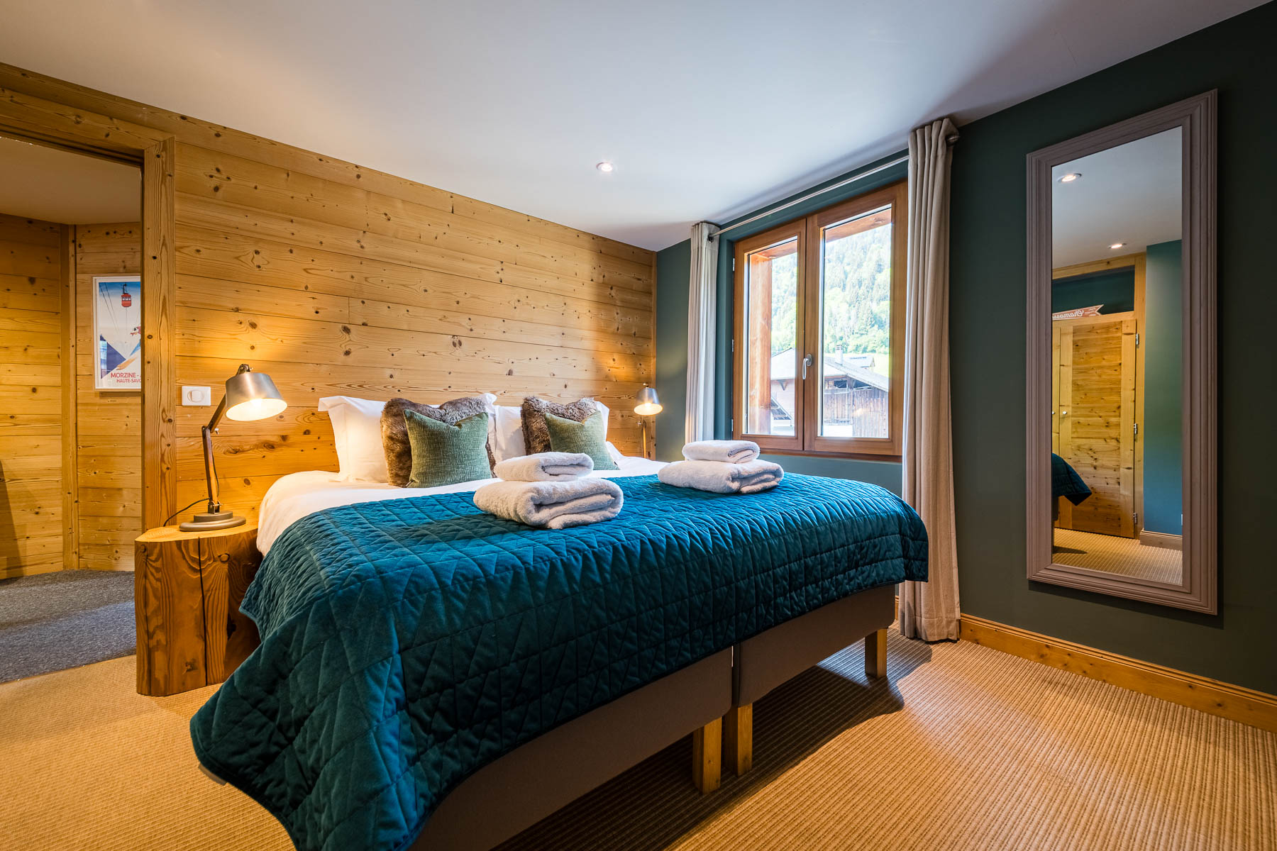 Double bedroom with mountain views at Chalet La Grange