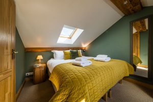Loft double bedroom with skylight at Chalet La Grange