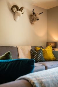 Lounge sofa with alpine décor at Chalet La Grange