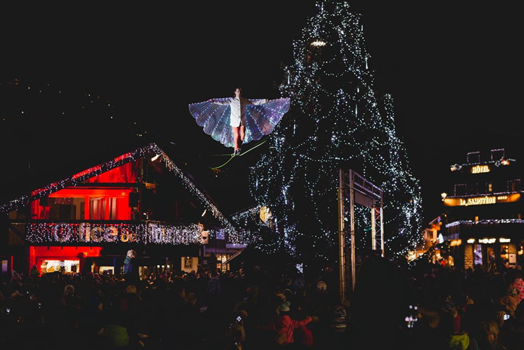 christmas tree lit up in morzine